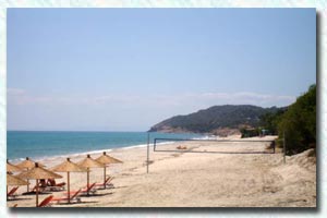 Western view of the endless Beach of Limenaria with beach volley